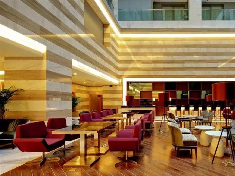 Shenzhen The Bauhinia Hotel, Mix City Shopping Center Экстерьер фото