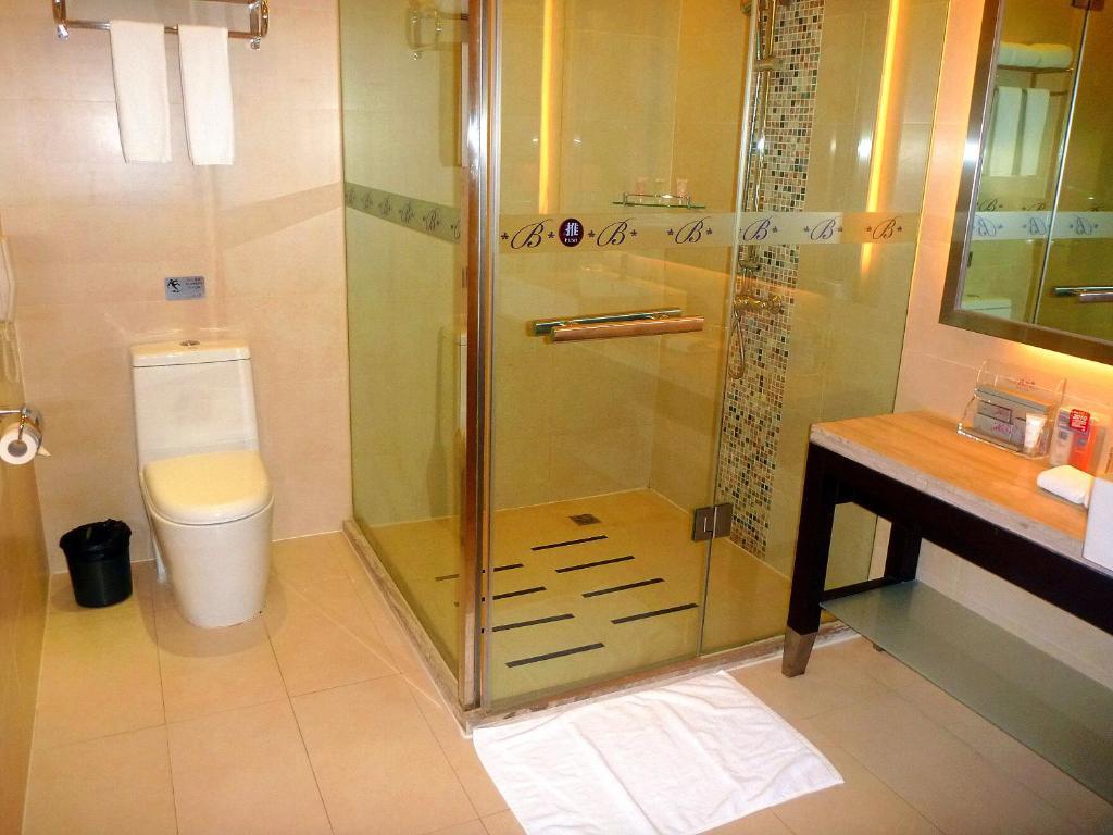 Shenzhen The Bauhinia Hotel, Mix City Shopping Center Номер фото